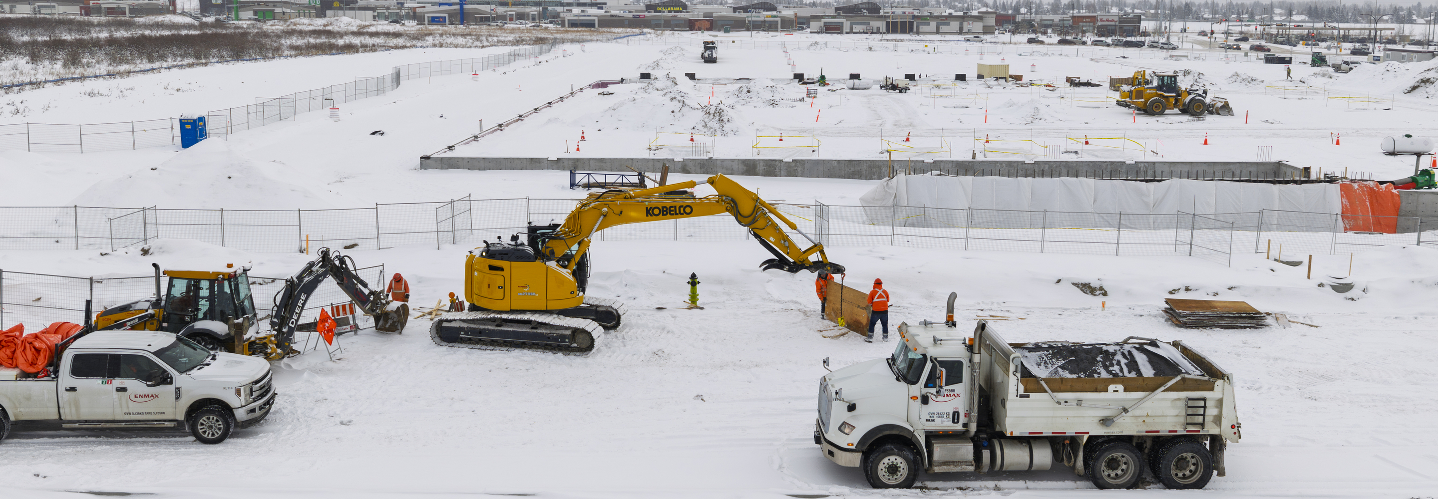 Aerial photo of ENMAX Power Civil crew removing concrete forms